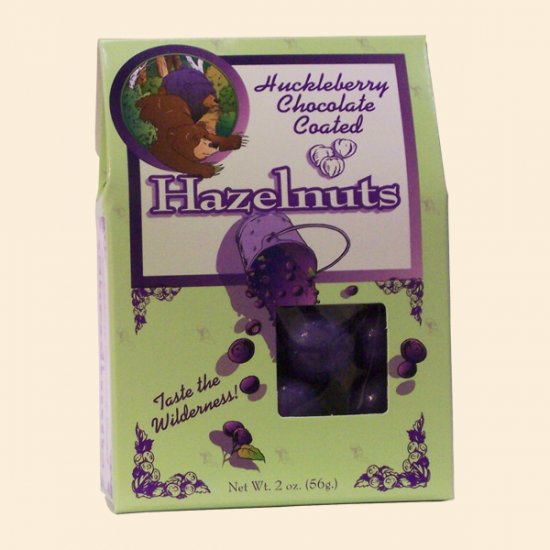 Huckleberry Choc Covered Hazelnuts 2 oz. (case of 24) - Click Image to Close